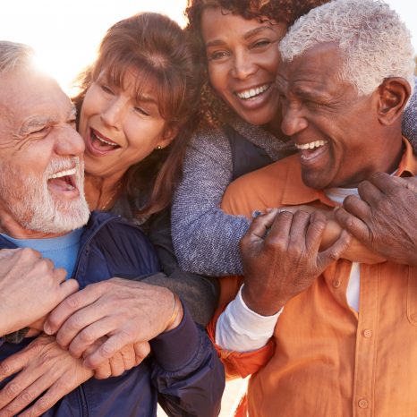 Happy group of Medicare eligible senior friends.