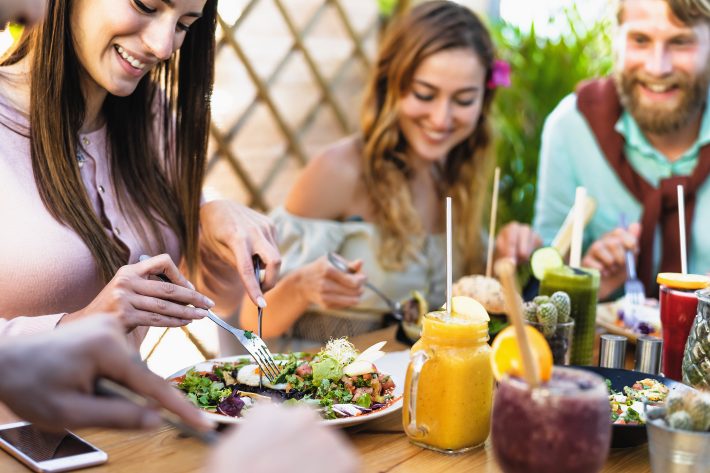 Happy Friends Lunching With Healthy Food In Bar Coffee Brunch –