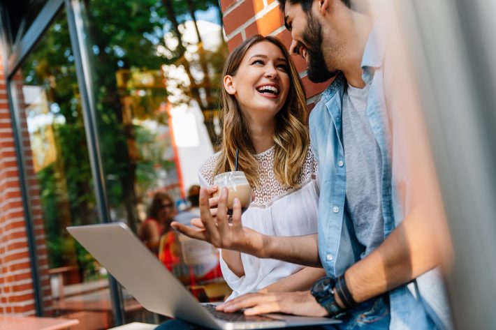 Happy Couple In Love Using Digital Devises For Work, Study Or So